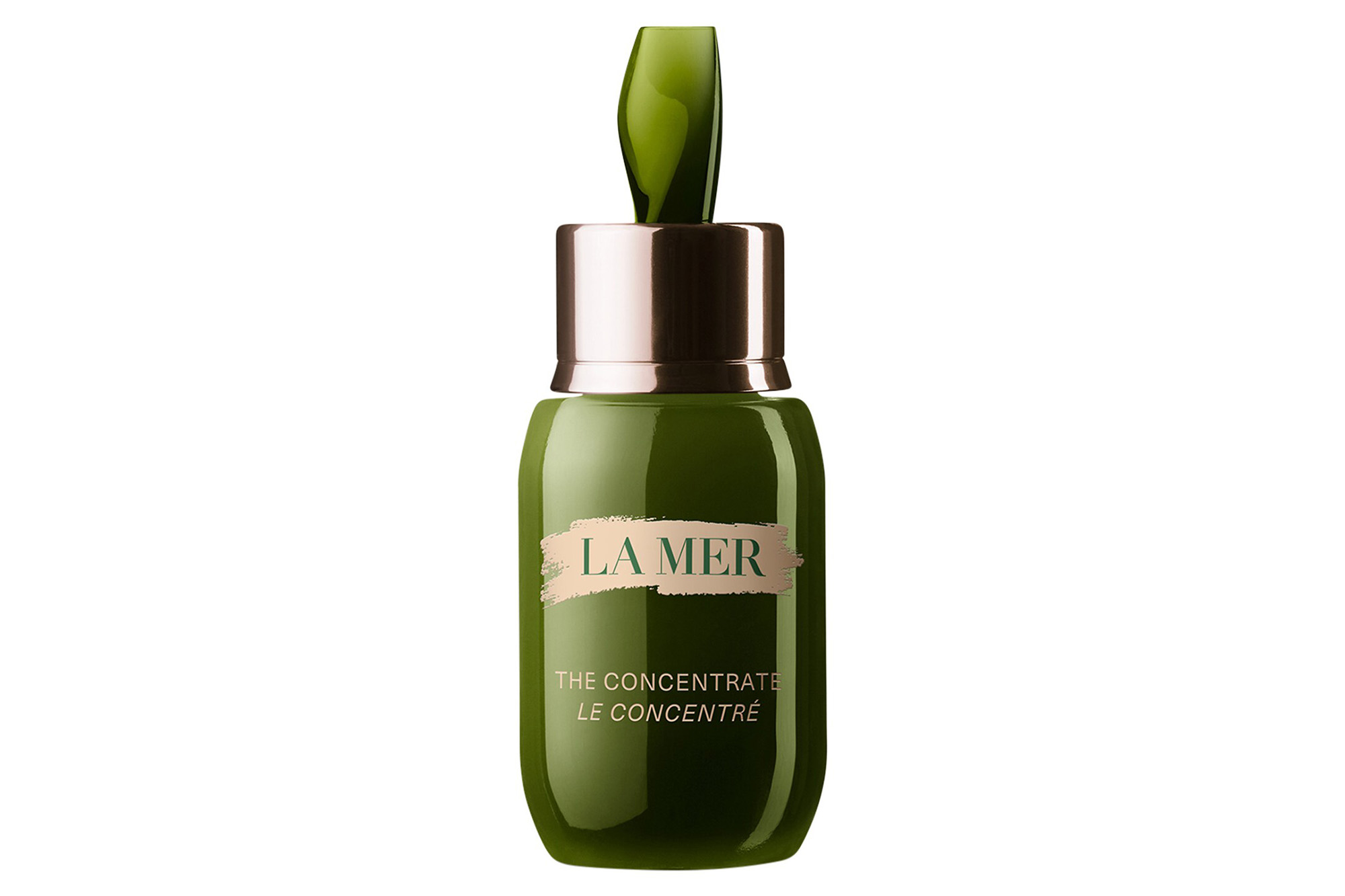 A green jar of La Mer serum