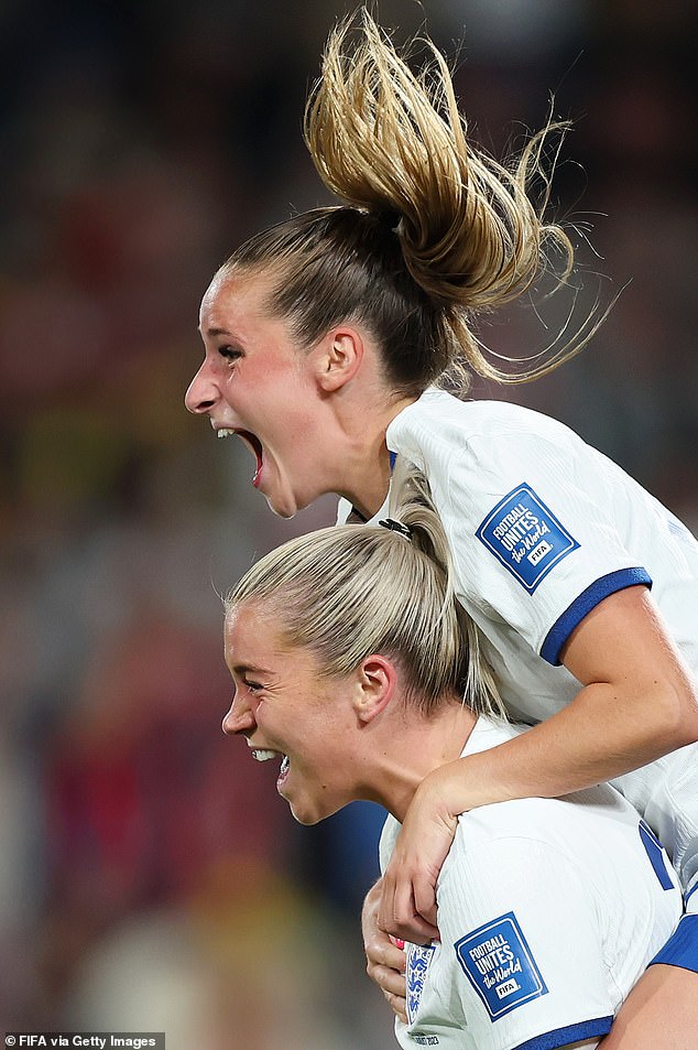 England celebrates after Alessia Russo (bottom) puts the Lionesses into the lead for the first time in the match