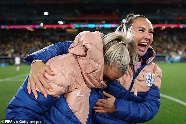 England's Russo and Katie Zelem celebrate the team's 2-1 victory in the FIFA Women's World Cup quarter final