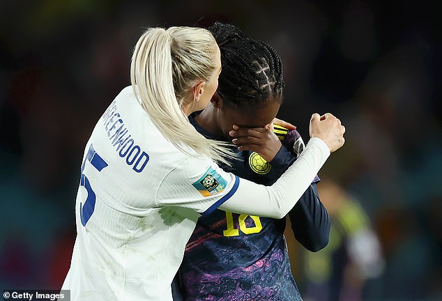 Linda Caicedo of Colombia is comforted by Alex Greenwood after their loss to the Lionesses