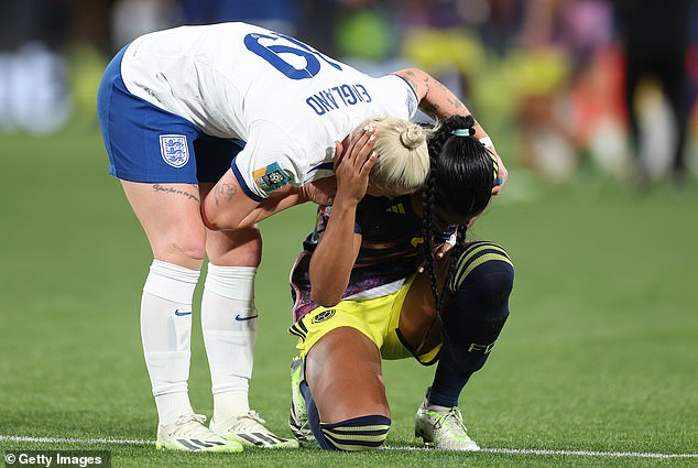 Daniela Arias of Colombia is consoled by Beth England after the game