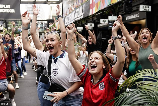 England fans celebrate as the final whistle blows in the quarter-final match on Saturday