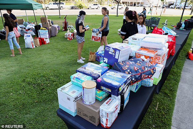 Donations for the victims of the Maui wildfires pile up at a site organized by the Ward Village Moms and Dads group, in Honolulu, Hawaii, U.S. August 12, 2023