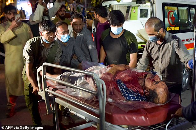A man injured in the Kabul terrorists attacks on Thursday arrives at hospital to be treated. Among those killed in the two bomb attacks were 13 US troops, including 11 US Marines and one Navy medic