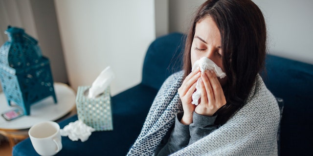 Frau mit Grippe