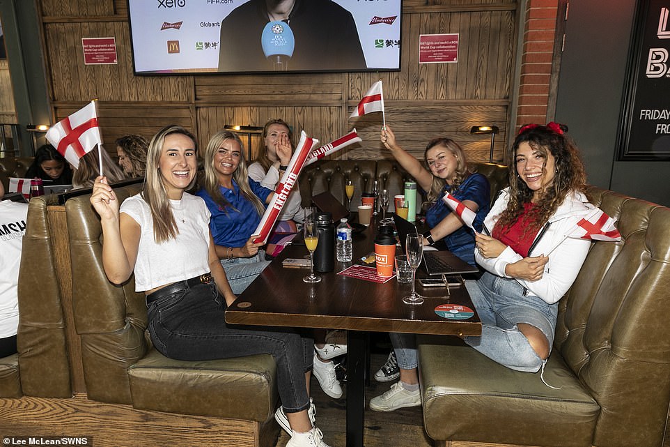 England fans watch the Women's World Cup match at the Box Leeds sports bar in West Yorkshire today