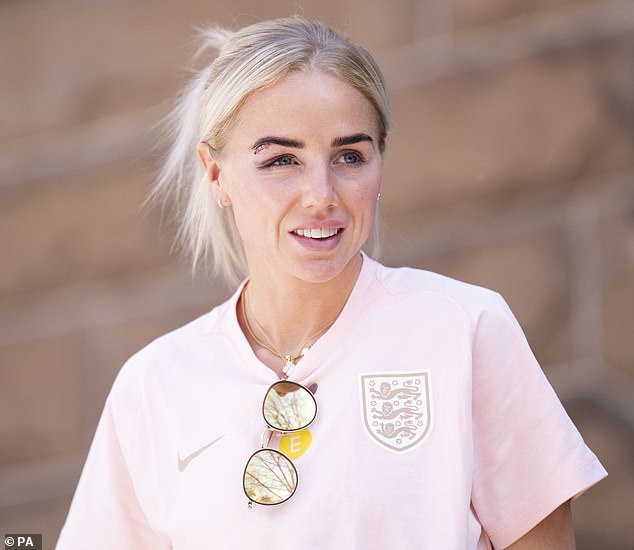 Alex Greenwood leaves their Sydney hotel yesterday - seen with a black eye after being kneed in the face in the final