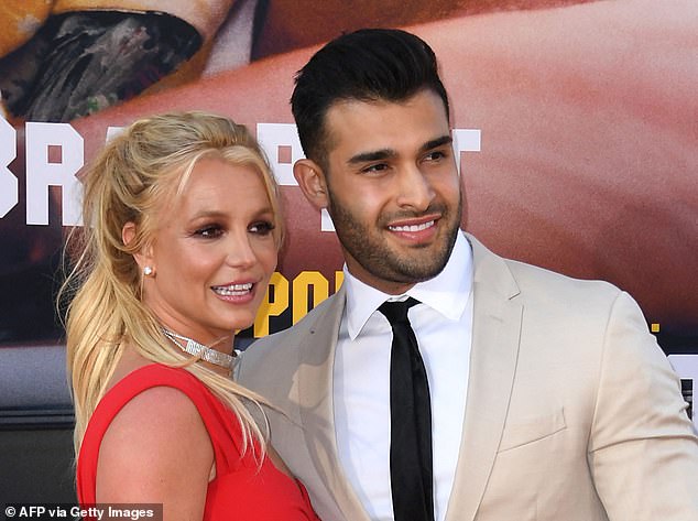 Britney Spears' estranged husband Sam Asghari won't receive any of the $15M that she's already raked in from her book deal nor will he be able to profit off of it; seen in 2019