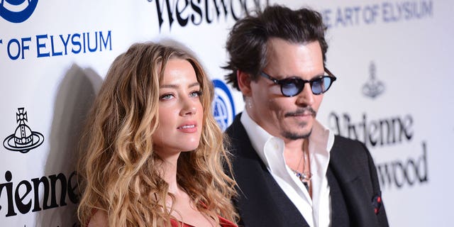 Amber Heard und Johnny Depp auf dem roten Teppich