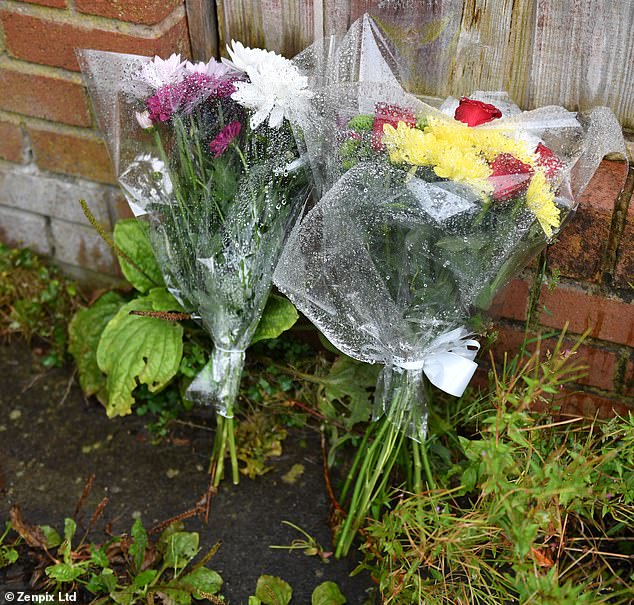 Floral tributes have since been left outside the home where the father was found dead