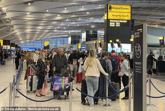 Large queues inside London Heathrow Airport Terminal Five this morning