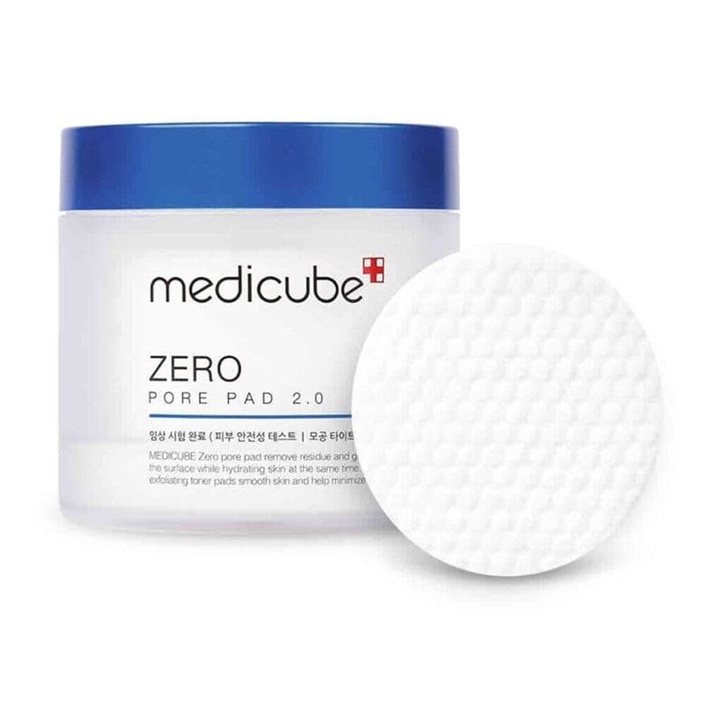 Eine Dose Medicube Zero Pore Pads 2.0 neben einem einzelnen weißen Tonerpad auf weißem Hintergrund