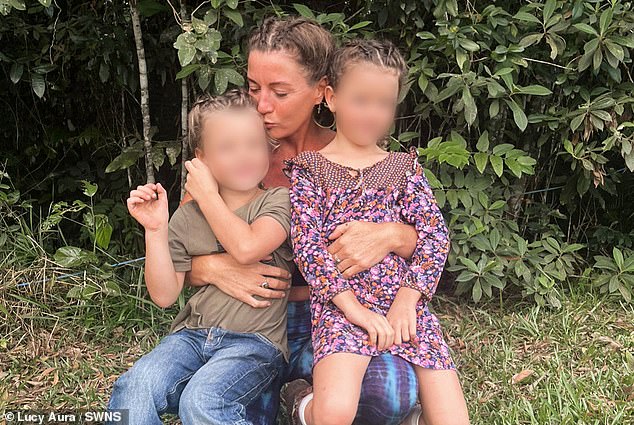 Lucy Aura, 41, who is originally from London, but lives in Kuranda, Australia, lives in a tent with her two children to be 'close to the ground' – and she prefers it to a modern 'constricted' house