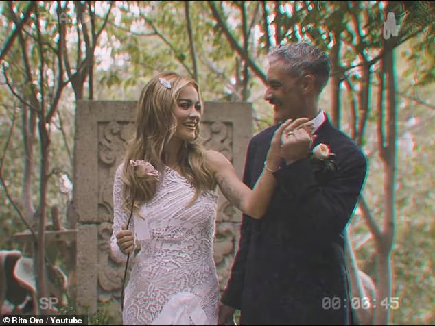 Gorgeous: Rita Ora, 32, has shared footage of the moment she married husband Taika Waititi, 47, as sh intimate clips from their secret wedding in the music video for her new single You & I