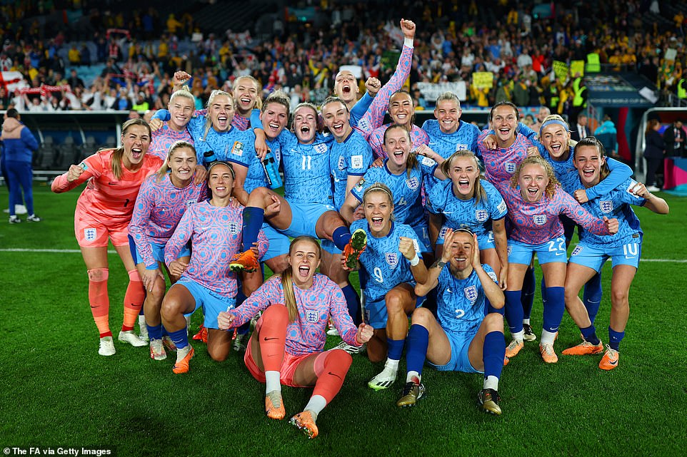 England's footballers celebrate following victory in the Women's World Cup semi-final at Stadium Australia in Sydney today