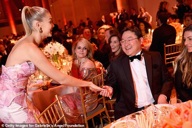 Gigi Hadid (right) and Jho Low (centre) attend Angel Ball 2014 hosted by Gabrielle's Angel Foundation at Cipriani Wall Street in New York City