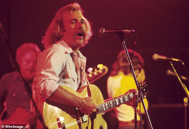 Jimmy Buffett performs with The Coral Reefer Band at The Omni Coliseum on September 4, 1976 in Atlanta, Georgia