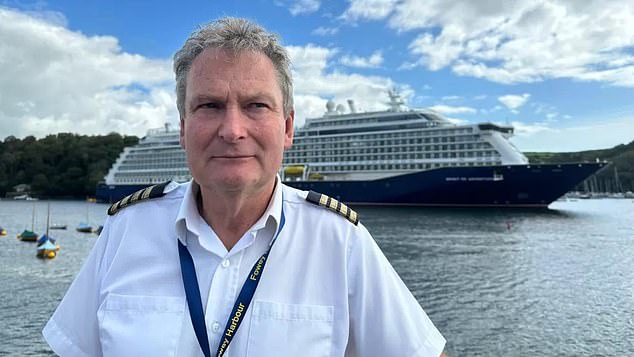The 775ft-long cruise ship weighing nearly 60,000 tonnes is the longest and heaviest ever to dock in Fowey, according to harbourmaster Paul Thomas (pictured)