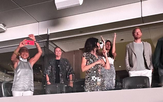 Prince Harry and Meghan Markle were pictured in the crowd watching Beyonce at the SoFi stadium in Los Angeles on Friday night. Pictured: Harry (right), Meghan (second right) and her mother Doria Ragland (far left) and her Suits co-star and close friend Abigail Spencer (centre)