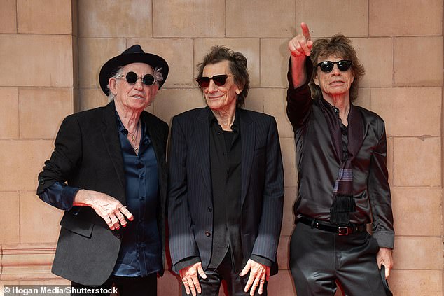 Coming soon: Arriving at the Hackney Empire in London, to crowds of screaming fans, Sir Mick Jagger , Keith Richard and Ronnie Wood revealed the record will drop October 20