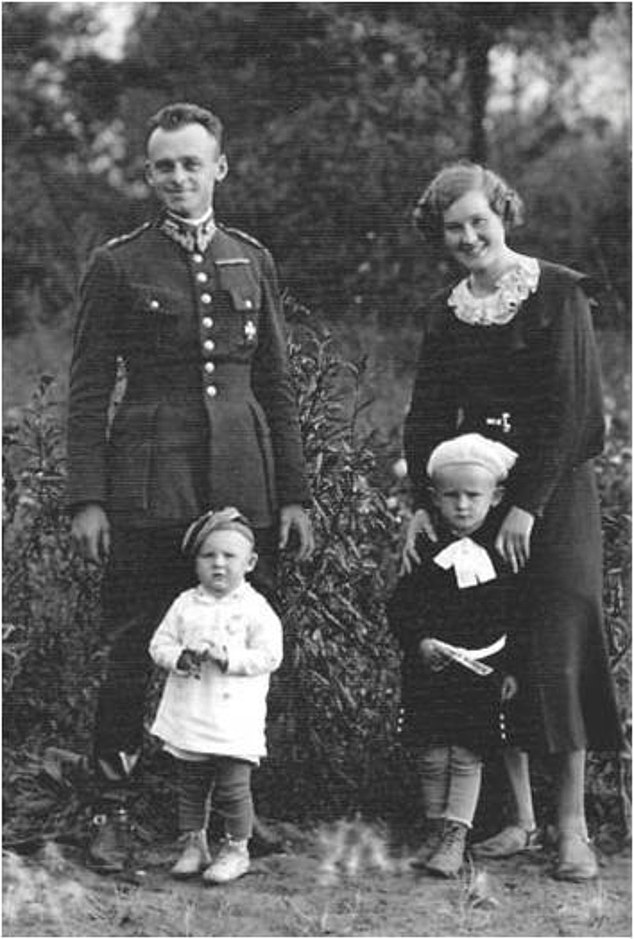 Pilecki is seen with his wife and children. He smuggled himself into Auschwitz just months after it had been set up in 1940