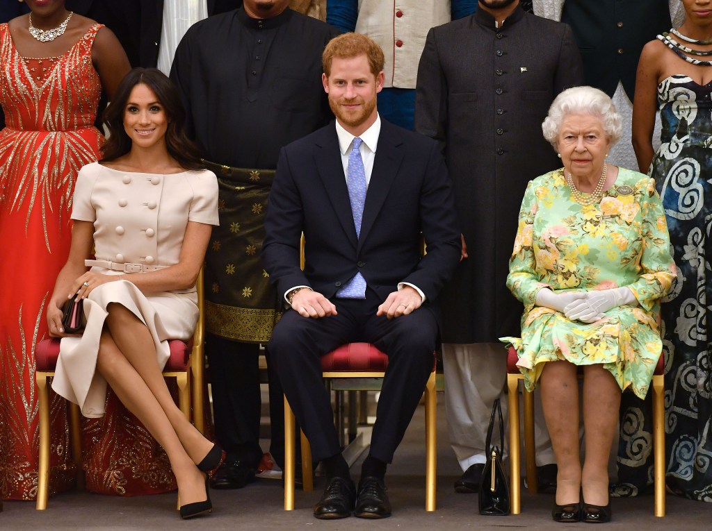 Prinz Harry und Meghan Markle mit der Königin. 