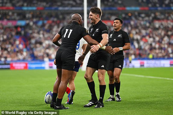 PARIS, FRANCE - SEPTEMBER 08: Mark Telea of New Zealand celebrates with teammates after scoring his team's second try during the Rugby World Cup France 2023 Pool A match between France and New Zealand at Stade de France on September 08, 2023 in Paris, France. (Photo by David Ramos - World Rugby/World Rugby via Getty Images)