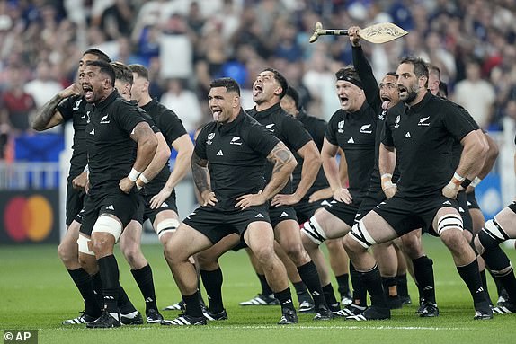 The New Zealand team perform the Haka before the Rugby World Cup Pool A match between France and New Zealand at the Stade de France in Saint-Denis, north of Paris, Friday, Sept. 8, 2023. (AP Photo/Christophe Ena)