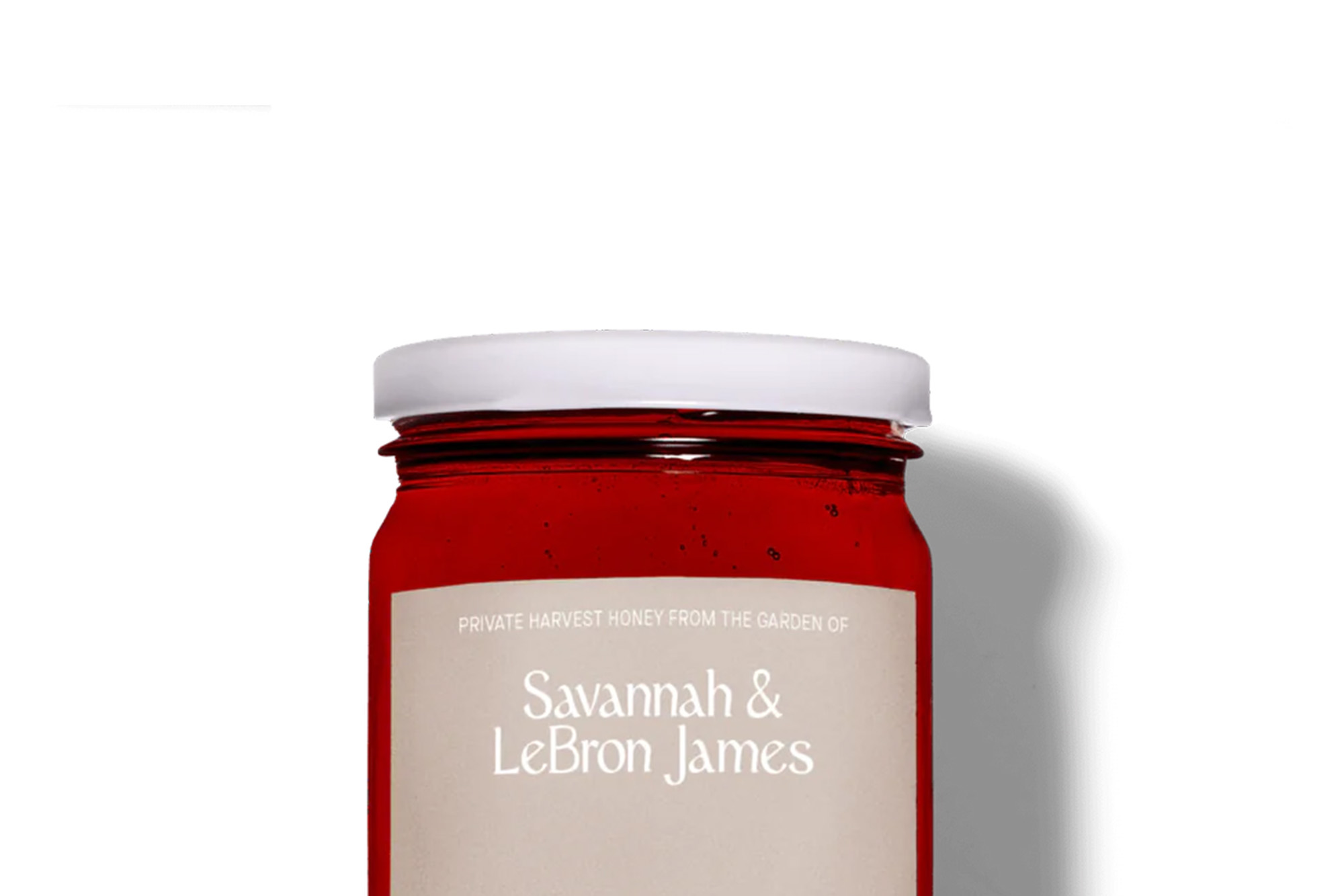 A bottle of red honey that says Savannah & LeBron James on the label