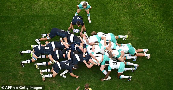 South Africa's scrum-half Faf de Klerk (TOP) watches as Scotland's scrum-half Ben White puts the ball into a scrum during the France 2023 Rugby World Cup Pool B match between South Africa and Scotland at Stade de Marseille in Marseille, southern France on September 10, 2023. (Photo by CHRISTOPHE SIMON / AFP) (Photo by CHRISTOPHE SIMON/AFP via Getty Images)