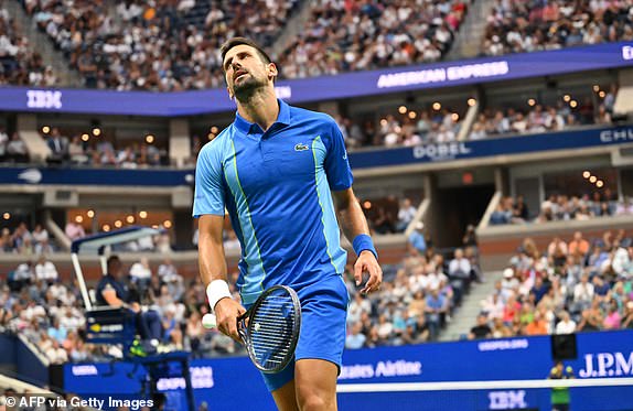 Serbia's Novak Djokovic reacts while facing Russia's Daniil Medvedev during the US Open tennis tournament men's singles final match at the USTA Billie Jean King National Tennis Center in New York City, on September 10, 2023. (Photo by ANGELA WEISS / AFP) (Photo by ANGELA WEISS/AFP via Getty Images)