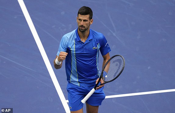 Novak Djokovic, of Serbia, reacts during a match against Daniil Medvedev, of Russia, during the men's singles final of the U.S. Open tennis championships, Sunday, Sept. 10, 2023, in New York. (AP Photo/Mary Altaffer)