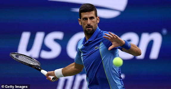 NEW YORK, NEW YORK - SEPTEMBER 10: Novak Djokovic of Serbia returns a shot against Daniil Medvedev of Russia during their Men's Singles Final match on Day Fourteen of the 2023 US Open at the USTA Billie Jean King National Tennis Center on September 10, 2023 in the Flushing neighborhood of the Queens borough of New York City. (Photo by Mike Stobe/Getty Images)