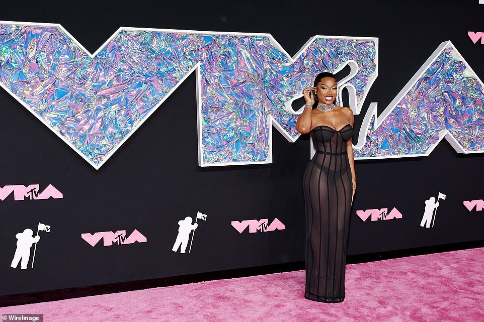 Glamorous! Joining her on the sheer fashion style was rapper Megan Thee Stallion, who looked incredible in a black see-through corset dress that also revealed her undergarments