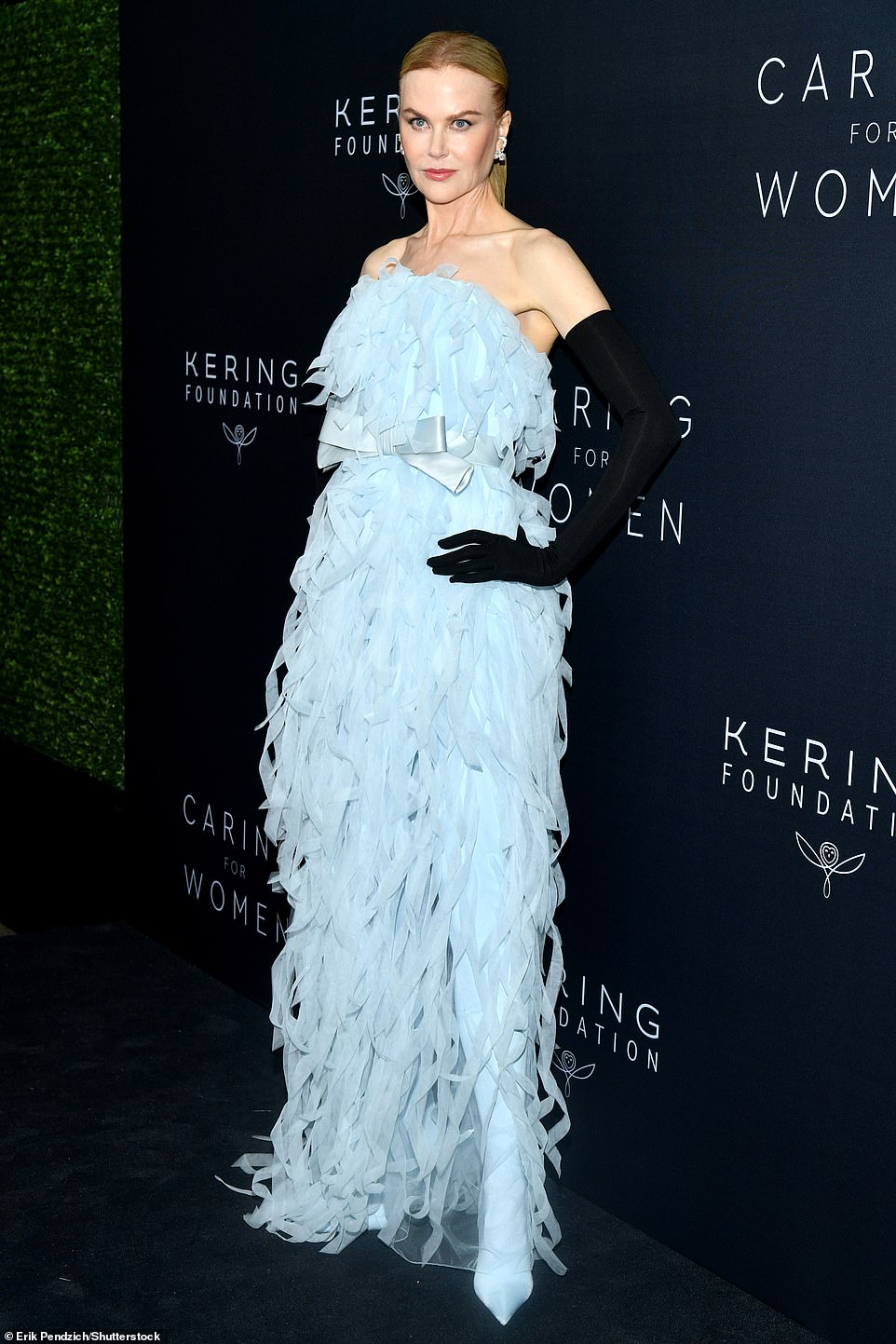 Beauty in blue: Nicole Kidman was a total beauty in a whimsical blue strapless gown that belted at the waist with a satin bow