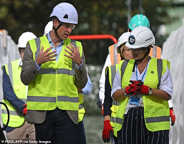 Wearing a light tweed blazer with a blue shirt and navy chinos underneath his hi-vis, the Prince met with industry workers to discuss the high suicide rate amongst labourers