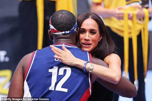 The Duchess hugged one of the stars of the tournament