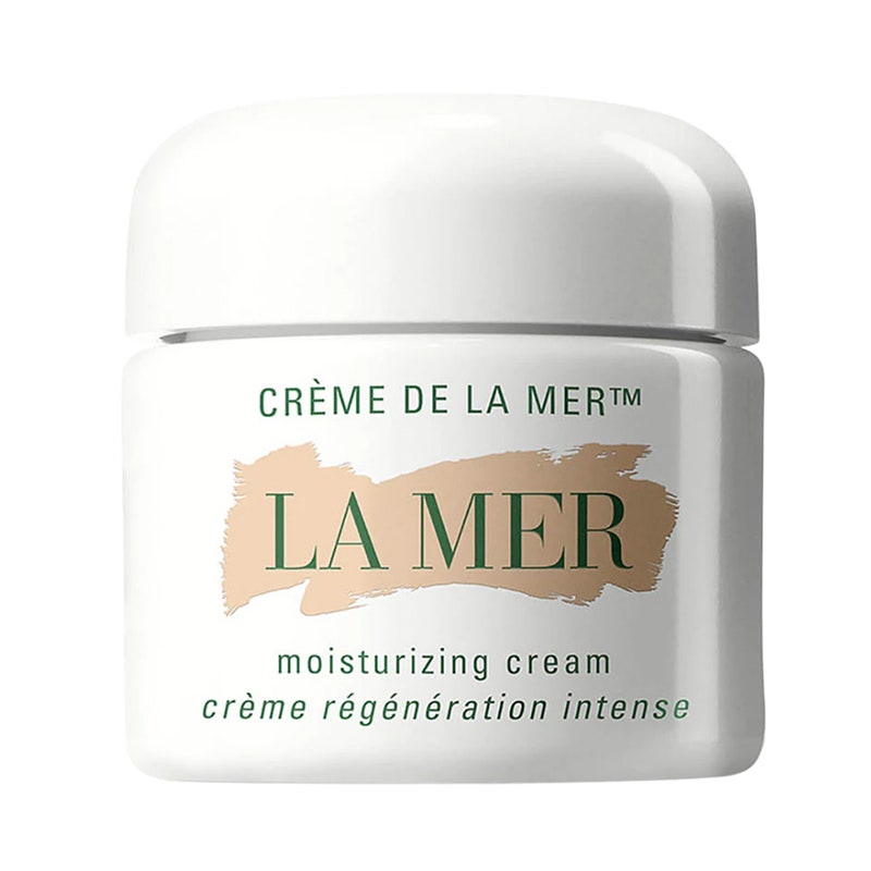 Ein weißes Glas mit grüner Aufschrift "La Mer Crème de La Mer Feuchtigkeitscreme" auf weißem Hintergrund.