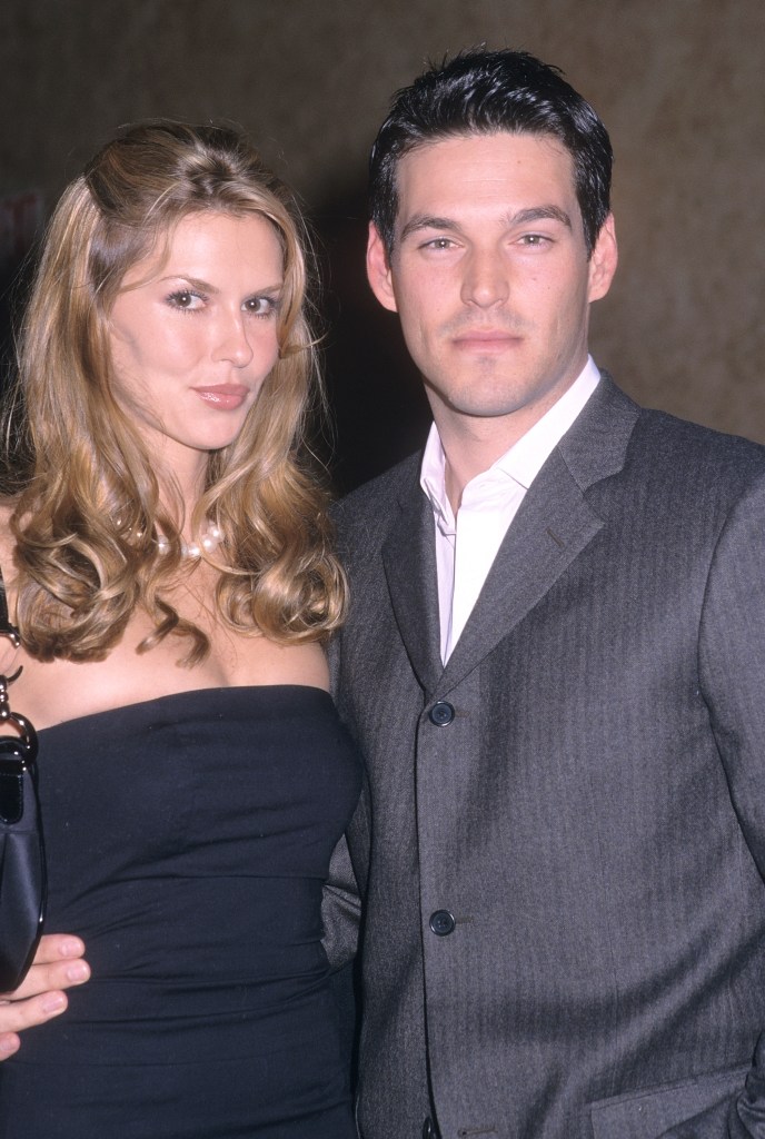 Brandi Glanville and Eddie Cibrian with serious expressions. 