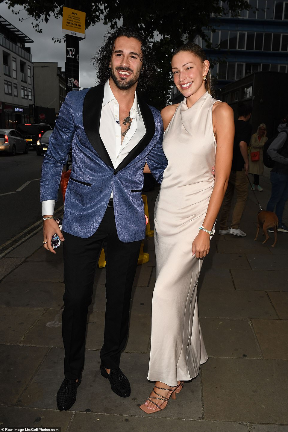 Twinkle-toed stars: Strictly Come Dancing professional Graziano Di Prima and his celebrity dance partner, former Love Island star Zara Mcdermott, posed arm-in-arm outside the venue