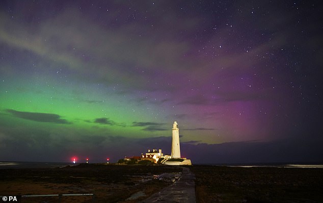 The northern lights (aurora borealis) over St Mary's lighthouse in Whitley Bay on the north-east coast of England. Picture date: Monday April 24, 2023