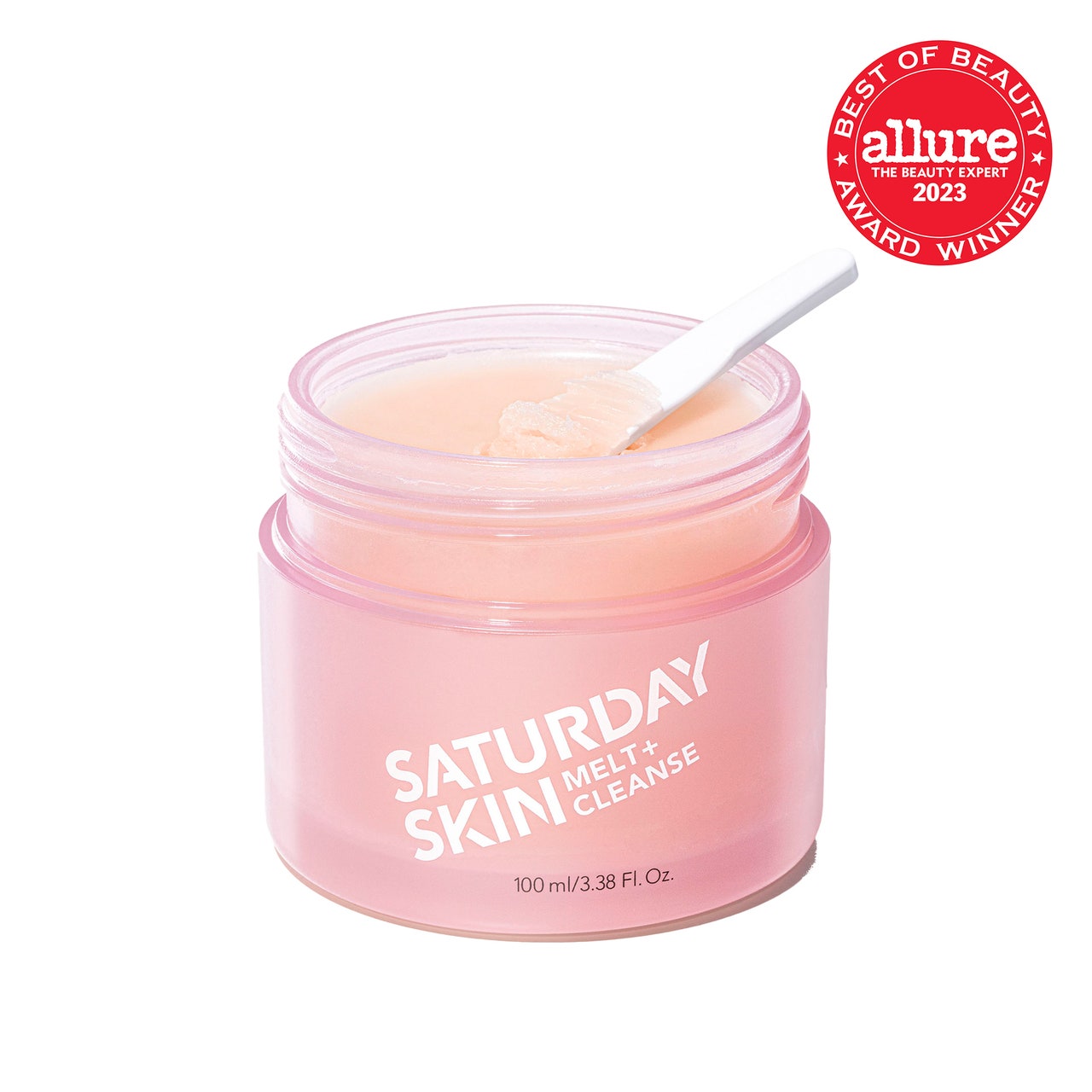Saturday Skin Melt + Cleanse Makeup Melting Balm pink jar of pink cleansing balm with a white spoon in it on white background with red Allure BoB seal in the top right corner