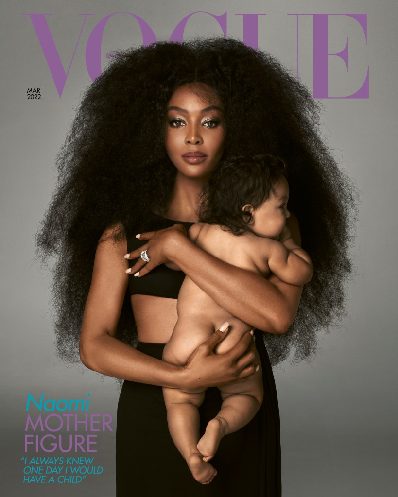 Naomi Campbell on the cover of Vogue, holding her baby daughter
