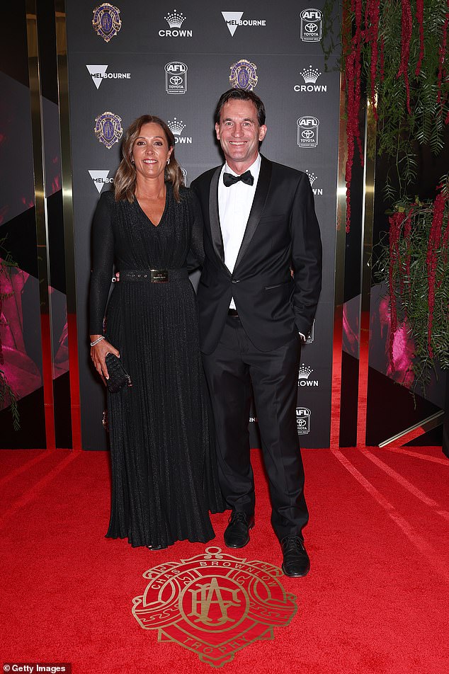 AFL CEO Andrew Dillon and his wife Amanda Dillon made a fine pair with Andrew in a classic tux and Amanda in a retro black maxi dress with sparkling elements