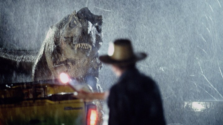 Sam Neill starrt auf den mächtigen T. Rex "Jurassic Park."