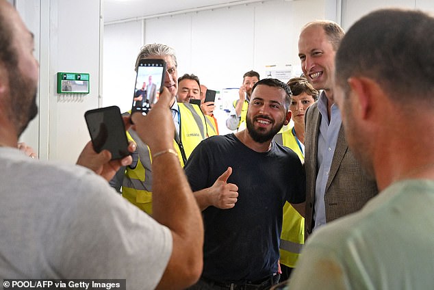 HRH Selfie: The Prince posed for photos with workers at the site