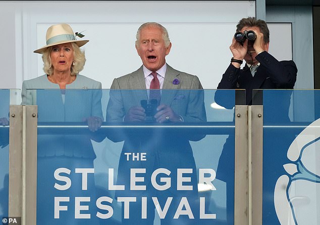 King Charles joined Queen Camilla at Doncaster races today just hours after he opened a farm in Scotland