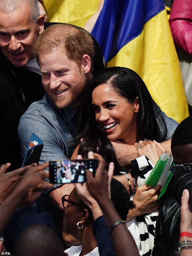 The Duke and Duchess of Sussex put on a red carpet-style display at the Invictus Games yesterday