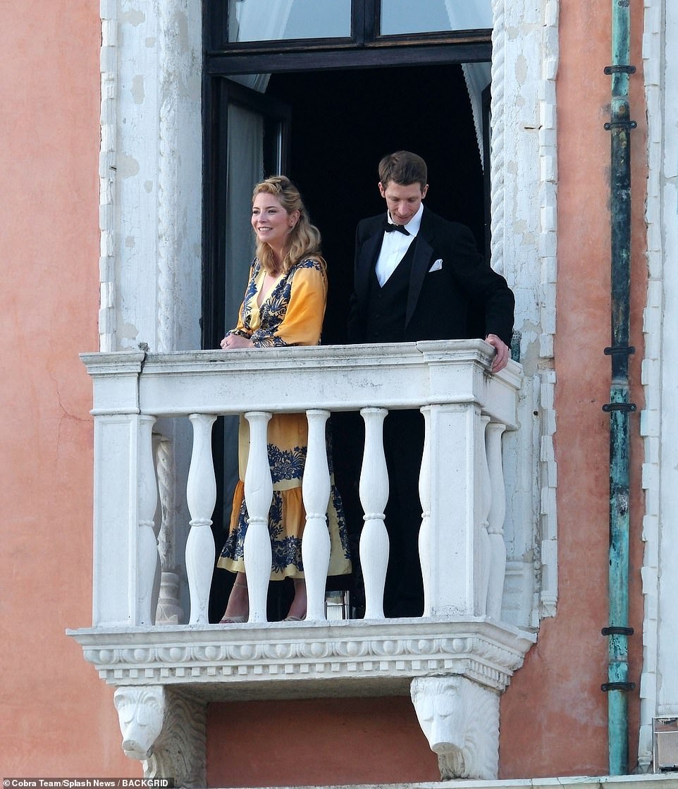 Delightful: Numerous guests were seen admiring the spectacular view across the Grand Canal