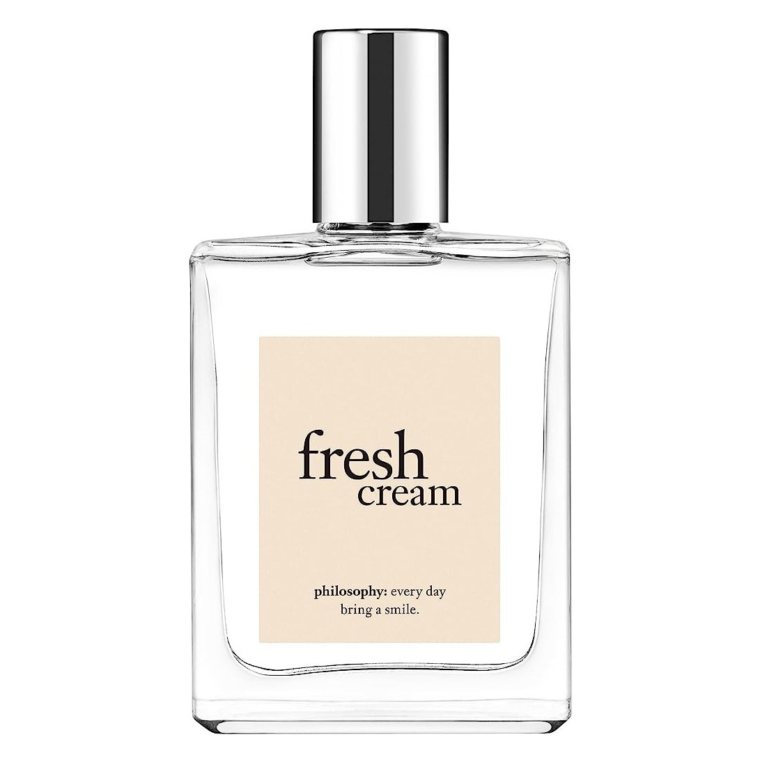Philosophy Fresh Cream Perfume transparente quadratische Parfümflasche mit beigem Etikett und silberner Kappe auf weißem Hintergrund